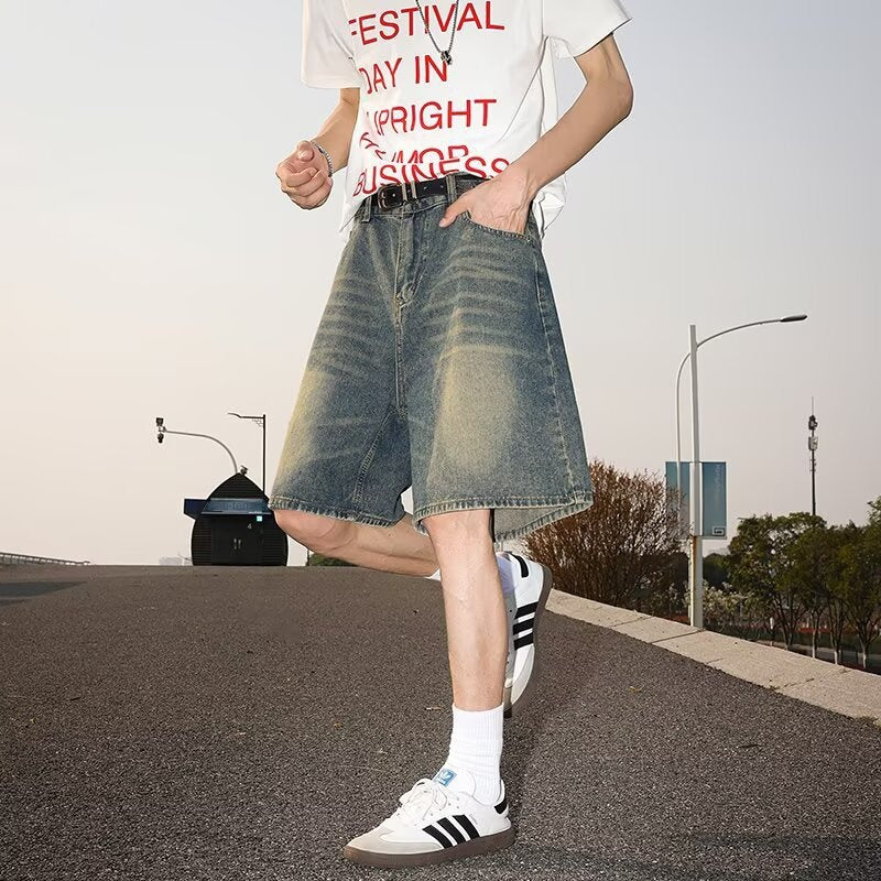 Washed and worn semi elastic waist denim shorts