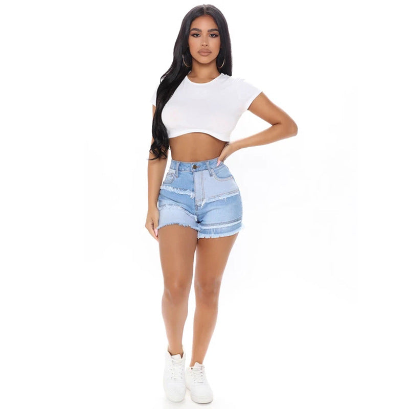 Spring European and American street fashion trendsetters washed hairy beard women washed ground white jeans light denim short