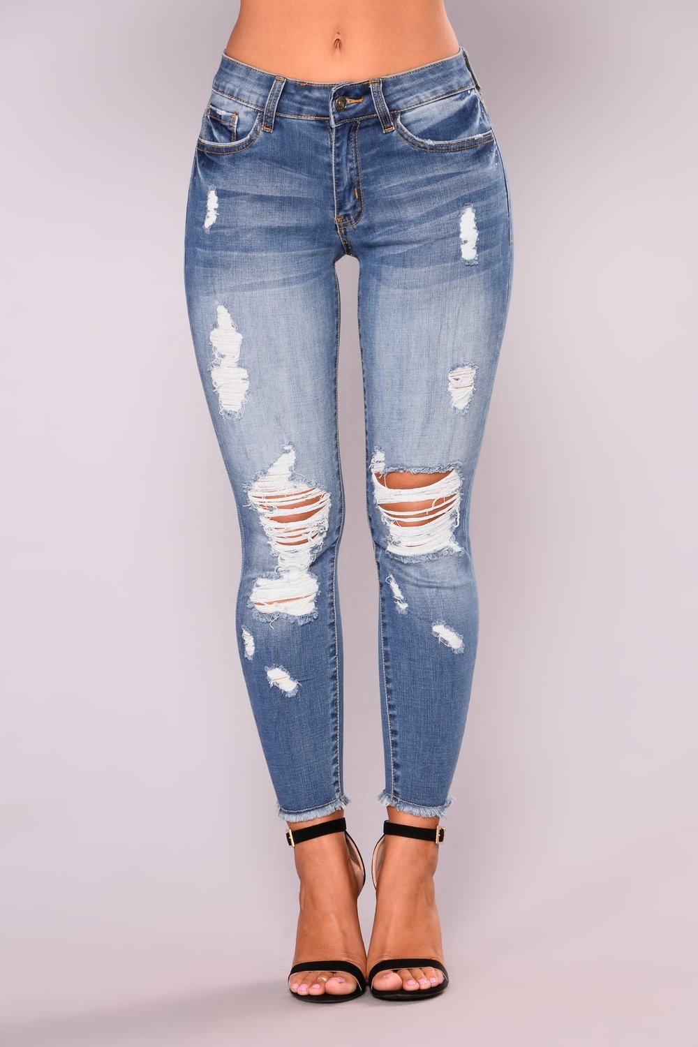 Summer high elasticity 9-point perforated women's clothing, tight fitting and hip lifting fashionable jeans with small feet