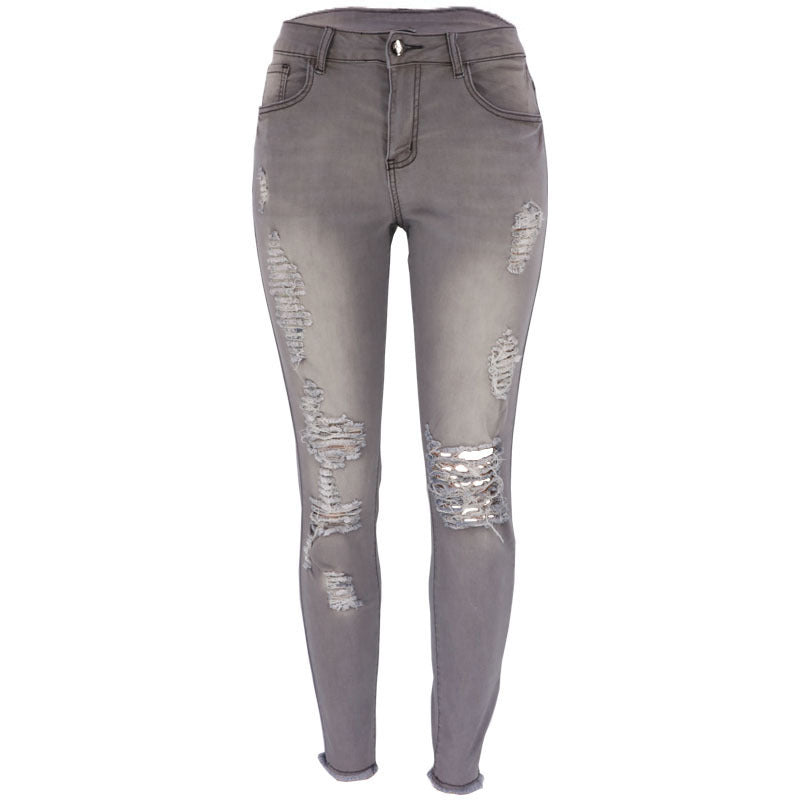 Summer high elasticity 9-point perforated women's clothing, tight fitting and hip lifting fashionable jeans with small feet