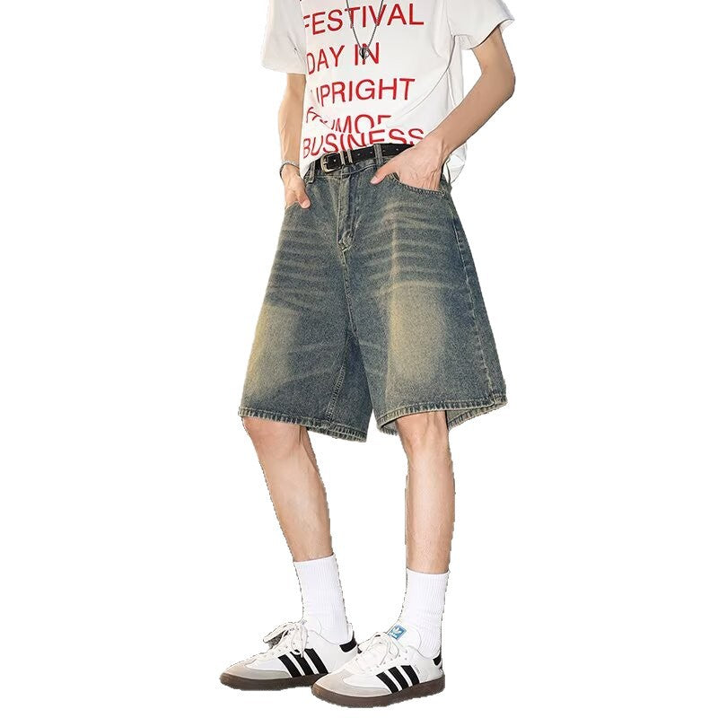 Washed and worn semi elastic waist denim shorts