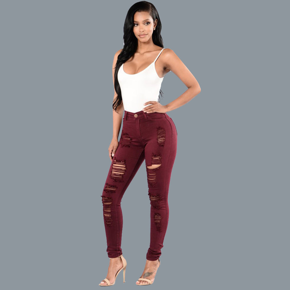 European and American knee ripped jeans, women's slim fit multi colored small leg pants, European station pants, women's pants, large size